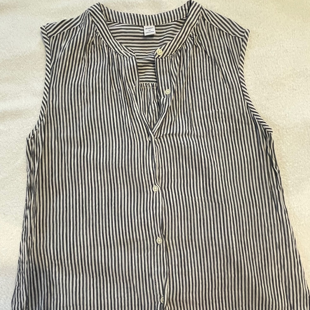 Blue/white striped, sleeveless, button down top